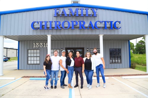 The team at Family Chiropractic Health Center standing outside of the office building