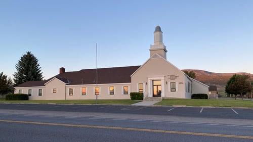 Church building exterior of The Church of Jesus Christ of Latter-day Saints located at 179 South Center Street in Lyman, UT.