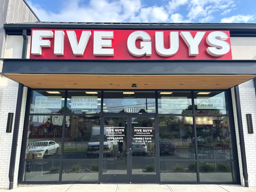 Exterior photograph of the Five Guys restaurant at 3115 NJ-38 in Mt. Laurel, New Jersey.