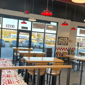 Image of the dining room of the Five Guys restaurant at 1221-A N. Memorial Pkwy in Huntsville Alabama.