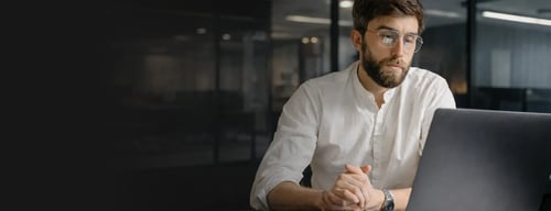 ARS Accounting advisor reviewing financials on a laptop