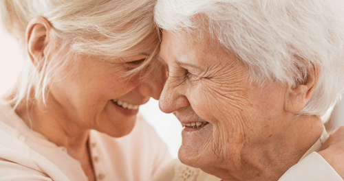 middle aged woman with elderly mother