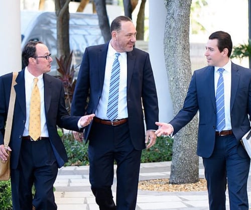 A group of personal injury and family law attorneys walking