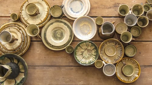 various ceramic dishes on table