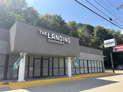 Sunny photo of the entrance to The Landing Dispensary, in Huntington, West Virginia