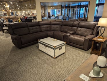 Amery Slumberland Furniture large leather sectional and chest