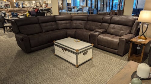 Amery Slumberland Furniture large leather sectional and chest