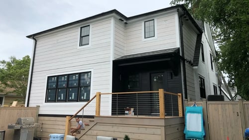 Street view of a newly constrcuted two story home