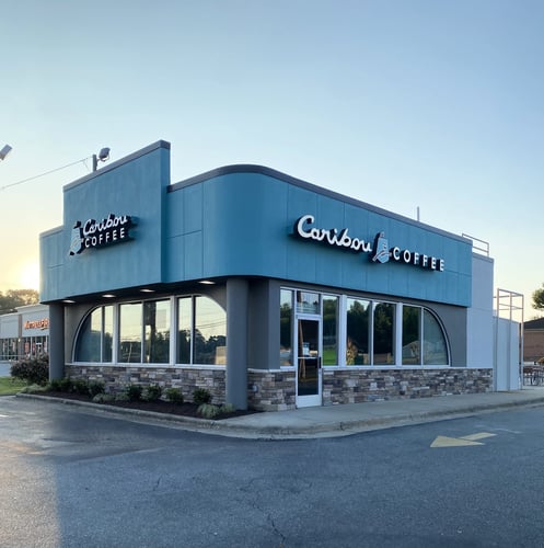 Storefront of the Caribou Coffee at 216 Huffman Mill Road in Burlington