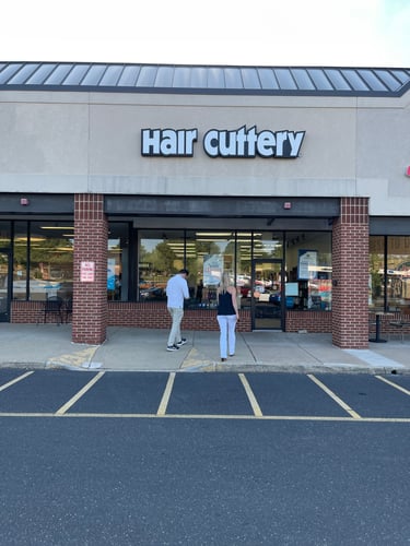 The front entrance of Hair Cuttery at Cross Keys Plaza.