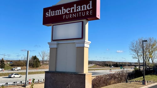 Woodbury Slumberland Furniture road sign