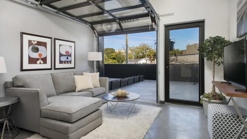 Living room with garage door window