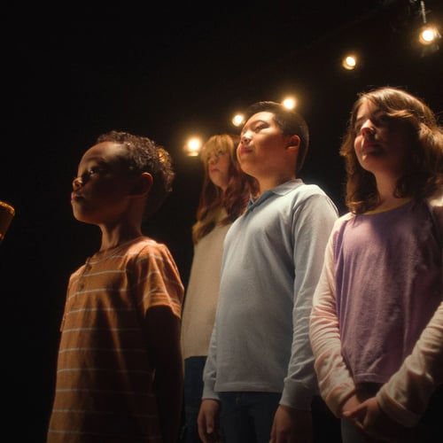 children singing the living jingle
