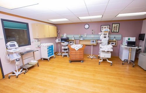 An infant warmer and bassinet in the nursery at our Women's Center