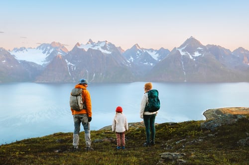 Couple hiking with their young child