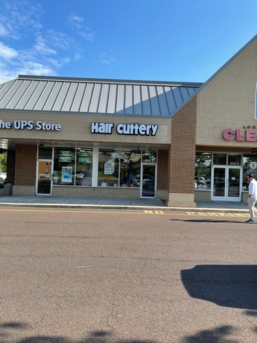 The front entrance of Hair Cuttery at Logan Square.