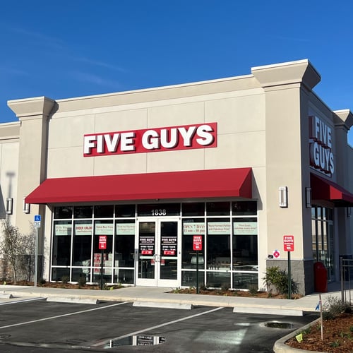 Exterior photograph of the Five Guys restaurant at 1838 N. Lecanto Highway in Lecanto Florida.