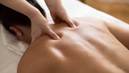 Person getting a deep tissue massage