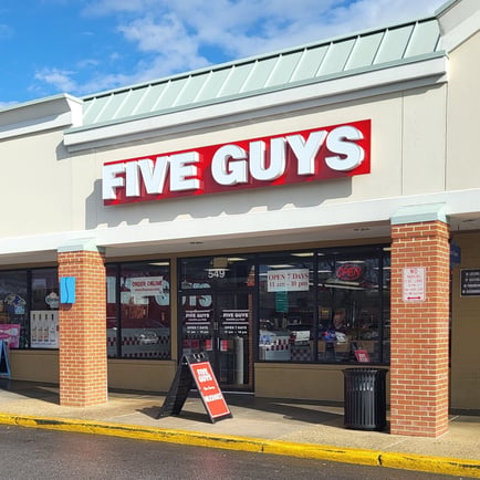 Exterior photograph of the Five Guys restaurant at 549 Ritchie Highway in Severna Park Maryland.