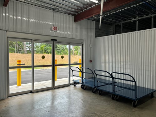 The storage entrance with our row of dollies for customers.