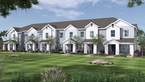 new townhomes with white and gray exterior and large grassy area