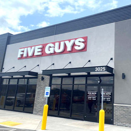Exterior photograph of the Five Guys restaurant at 3025 S. Kinney Coulee Road in Onalaska Wisconsin.