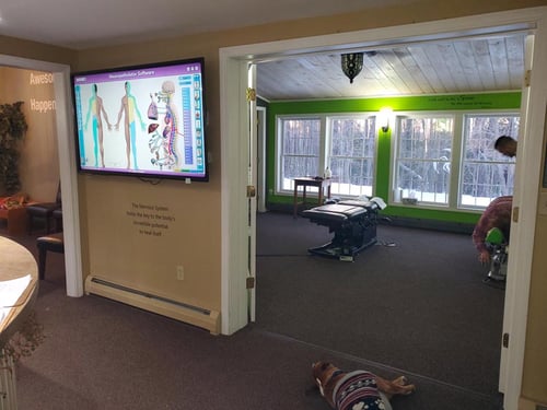 The hallway between the reception desk and a treatment room at LaValee Chiropractic in Oakland Maine