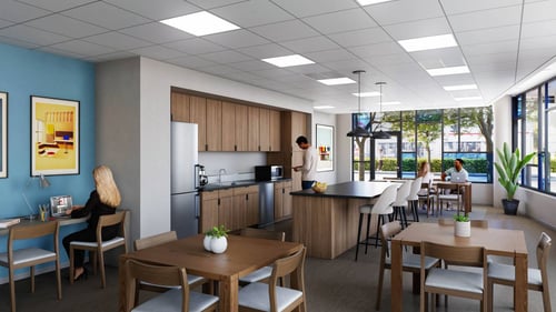 The interior view of a community room with big windows and wooden furniture