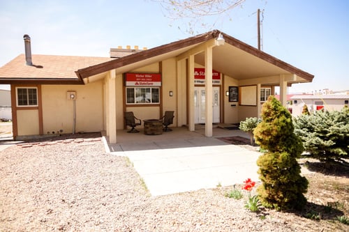 Tan building with brown trim