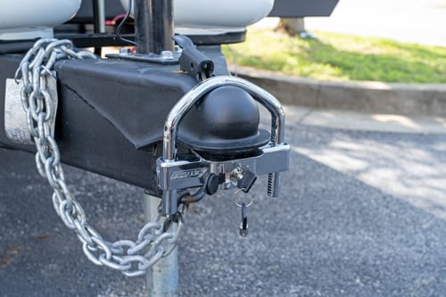 closeup of a trailer hitch & hitch lock