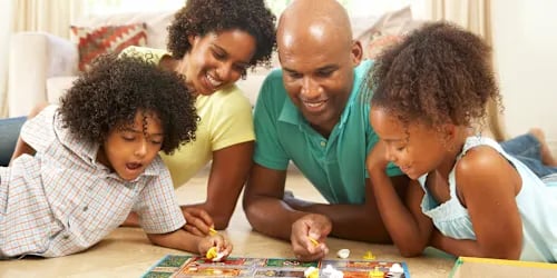 family-playing-board-game