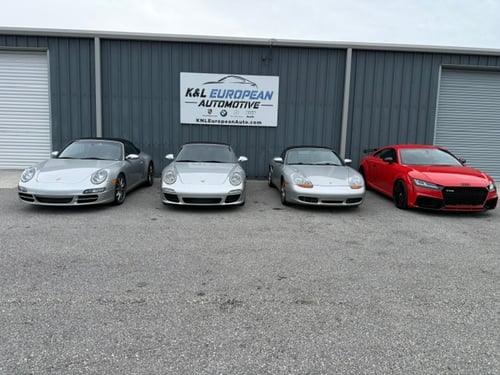 Multiple European cars in front of K&L European Automotive