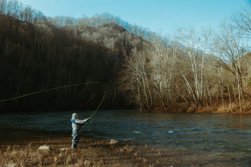 Angler flyfishing in the Clinch River in the winter