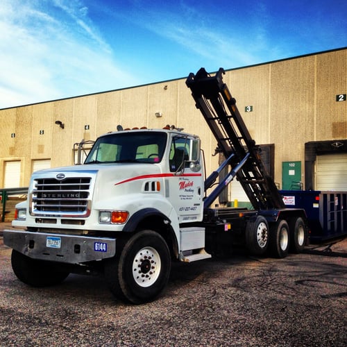 Mudek Trucking and J & J Recycling company vehicle