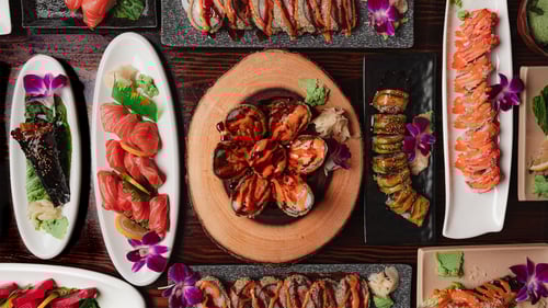 Variety of sushi and sashimi dishes at Wakatobi Japanese Grill