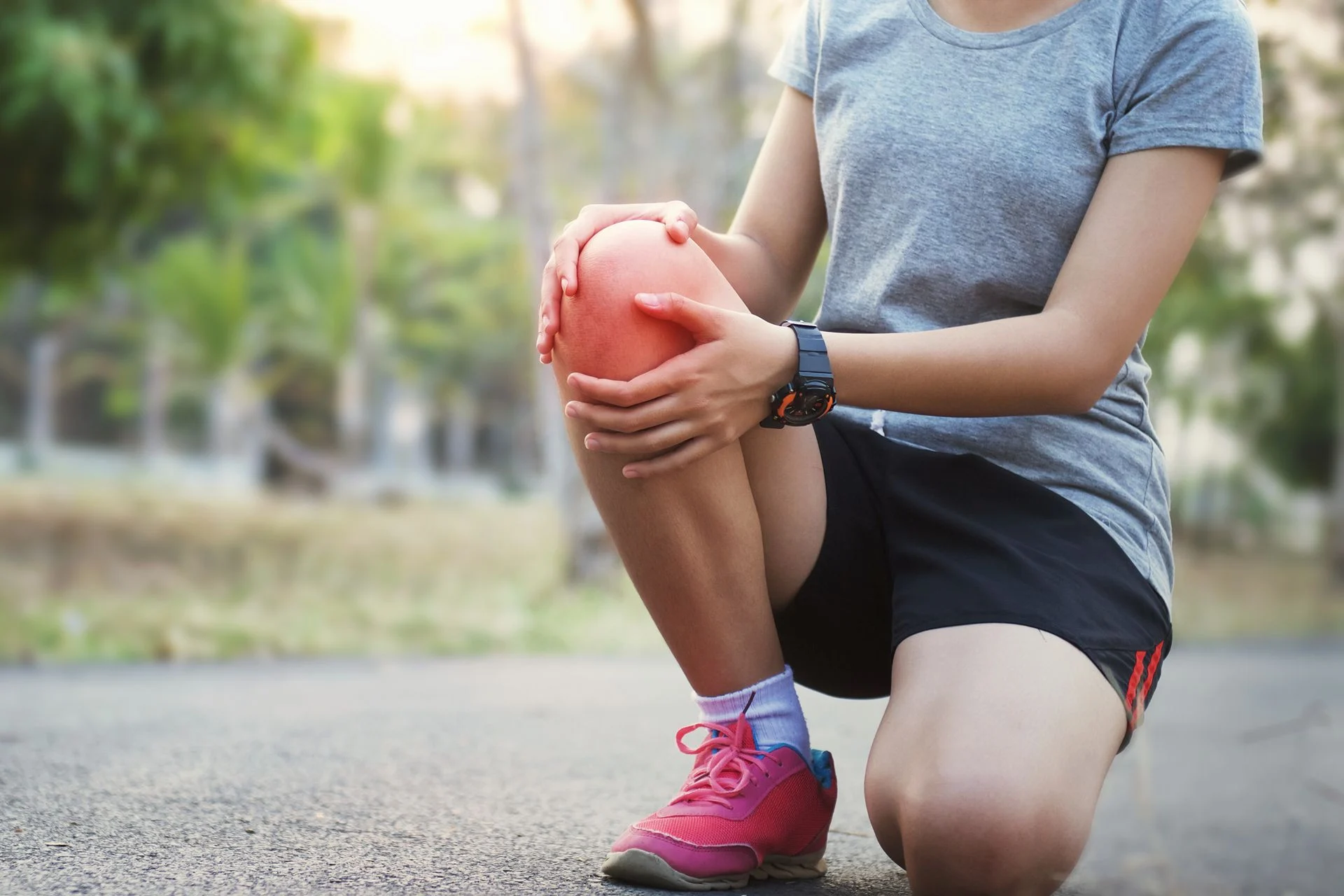 active person with knee pain out on a walk
