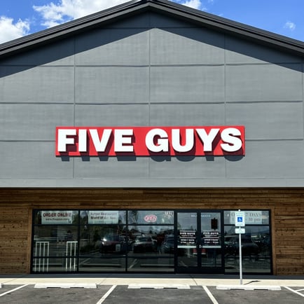 Exterior photograph of the Five Guys restaurant at 7329 North Culture Way in Coeur D'Alene Idaho.