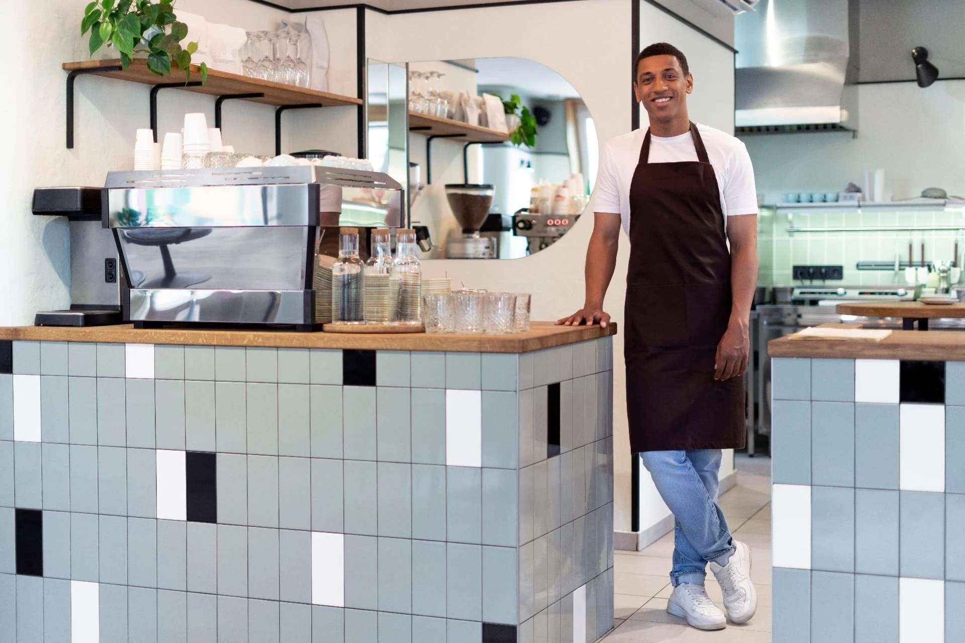 person wearing non slip shoes in a restaurant