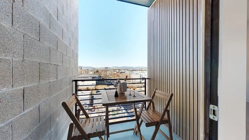 Balcony View at The Mile Apartments in Denver, CO 80204