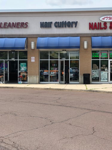 The front entrance of Hair Cuttery at Limerick Crossing Shopping Center.