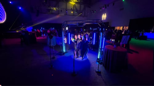 360 photo booth on an illuminated dance floor