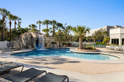 Take a dip in our outdoor pool and cool off from the Florida sun.