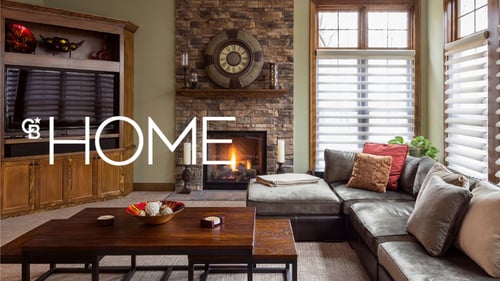 living room with the word 'HOME' on top of all items