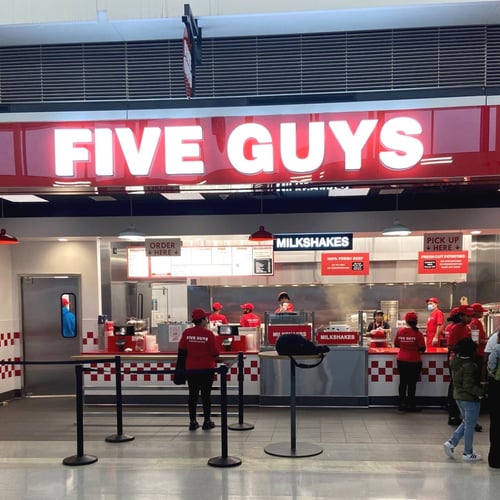 Photograph of the entrance to the Five Guys restaurant at Concourse B in Dulles International Airport in Dulles Virginia.