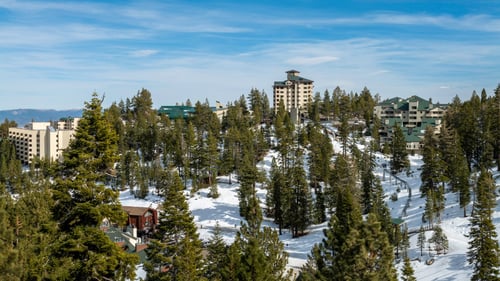 Exterior view of the resorts and snow-covered mountains.