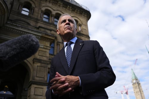 Mark Carney speaks to reporters about Canadian counter tariffs.
