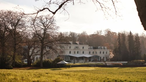 The exterior of the Mansion House at Coworth Park in the evening light