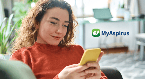 Person using MyAspirus app on mobile.