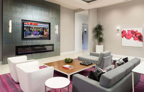 Lounge Area With TV And Fireplace at Metropolis Apartments, IRVINE California