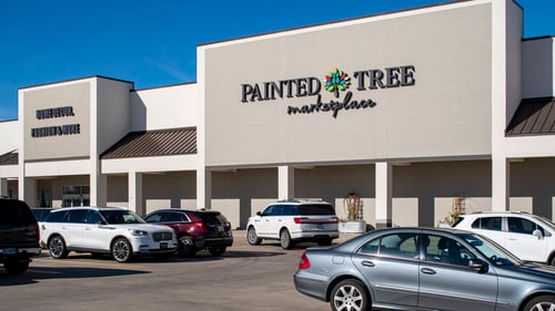 Filled parking lot of Painted Tree Marketplace